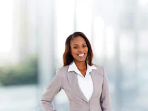Female professional wearing business attire in business school setting